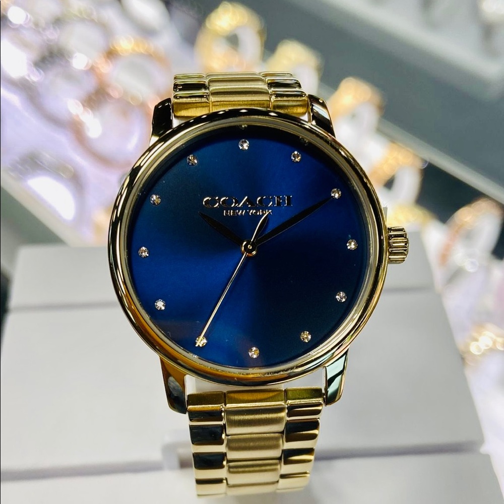 Coach gold watch